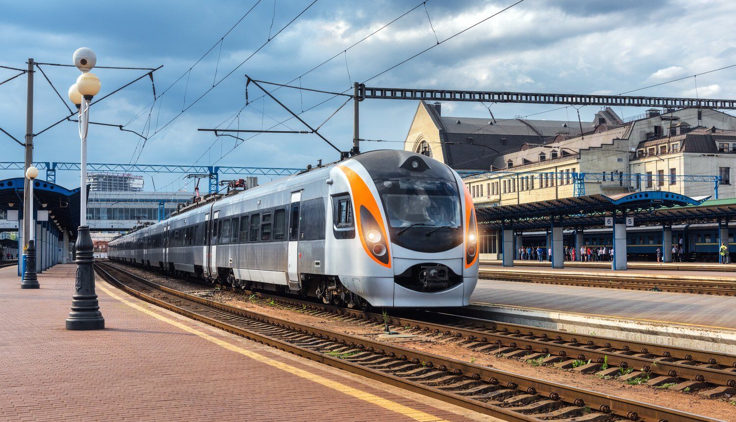 high-speed-train-at-the-railway-station-at-sunset-2021-08-26-17-00-49-utc-Jun-04-2024-03-18-05-7384-PM